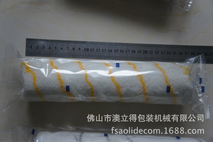油漆刷包装机，佛山油漆滚筒全自动包装机械厂家