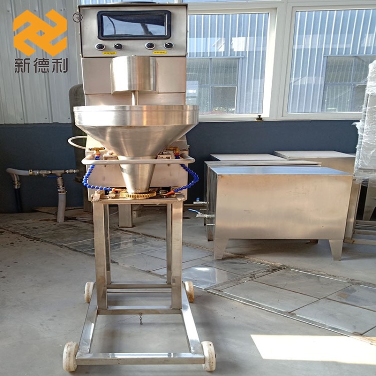 批发食品加工设备萝卜丸子成型机包心鱼丸机新得利机械丸子机定制