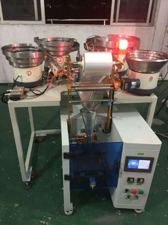 XHS320防火门顺位器组装螺丝钉配件全自动包装机